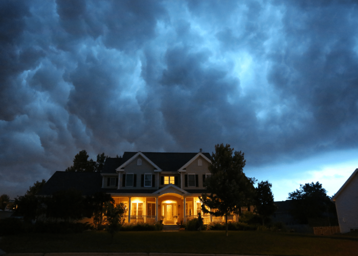 House With Storm Clouds Behind It